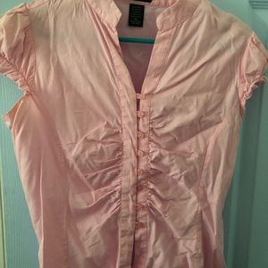 Pink blouse brand is Sam and Max